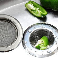Detailed view of the sink strainer's fine mesh design for effective clog prevention.