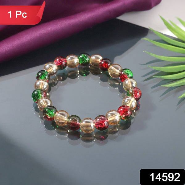 Close-up of glossy multicolor beads on elastic stretch bracelet