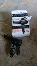 Calm & Curl brand logo on the side of the black 1800W professional hair dryer.