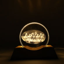 Clear crystal plate featuring 3D engraved running horses on LED table lamp