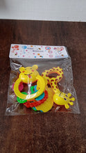 Three colorful baby toys in animal shapes designed for teething comfort