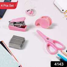 A pink mini stapler, tape dispenser, scissors, and a box of staples on a white surface, with a 