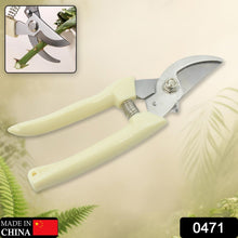 Close-up of the sharp blades of the pruning shears, ready for cutting.