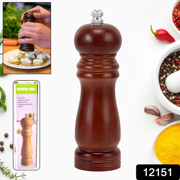 Close-up view of a classic wooden pepper mill, showcasing its natural grain and smooth finish.