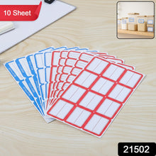 Multiple sheets of red and white self-adhesive label stickers stacked