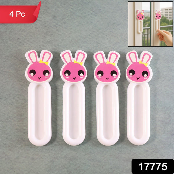 Door pull set on wooden cabinet using self stick push pull helper handles