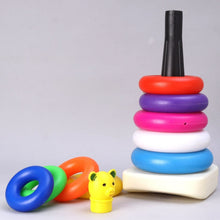 Close-up of the educational teddy bear stacking rings in various bright colors.