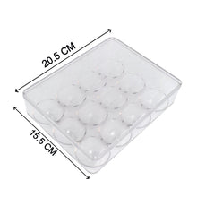 Multiple Organivo egg storage boxes stacked neatly inside a fridge.