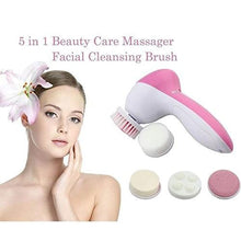 The portable pink body exfoliator with its five interchangeable heads displayed.