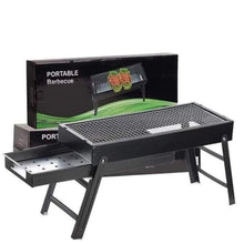 FirePot portable charcoal BBQ grill unfolded and ready for use outdoors.