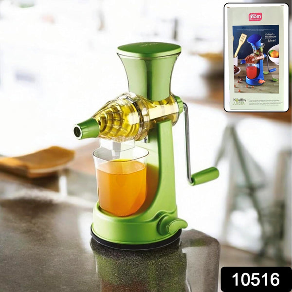 Close-up of hand press operation on manual fruit juicer