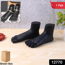 Side view of black foot mannequin display stand pair for showcasing anklets and toe rings
