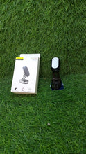 Packaging of the magnetic car phone holder, highlighting key features.