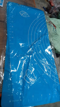 Detailed view of the smooth, non-slip surface texture of the silicone baking mat.