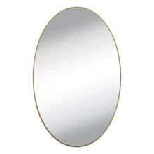 Self-adhesive frameless oval mirror sticker positioned above a dresser, perfect for dressing.