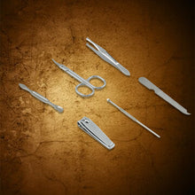 The complete 6-in-1 stainless steel manicure set presented with its sturdy travel case.