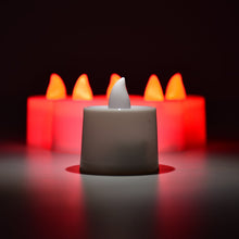 LED tea lights casting a soft red glow, ideal for home decoration.
