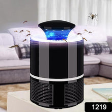The FlyTamer mosquito killer lamp operating silently on a bedside table in a modern Indian home.