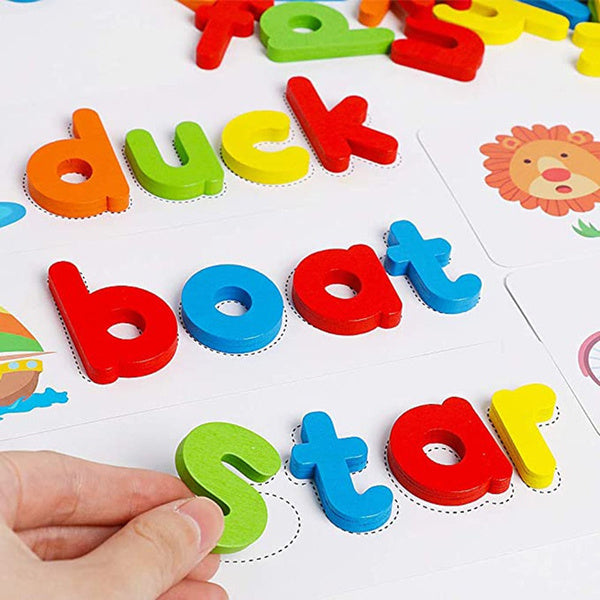 Colourful magnetic letters arranged on a whiteboard for alphabet learning.