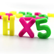 Brightly colored magnetic numbers and math signs for fun, hands-on learning.