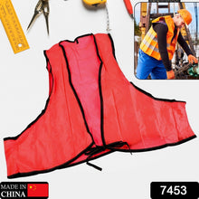 A person wearing a fluorescent yellow high visibility safety vest, demonstrating its comfortable fit and purpose.