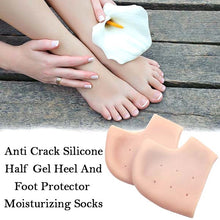 Multiple pairs of silicone heel protector socks displayed.