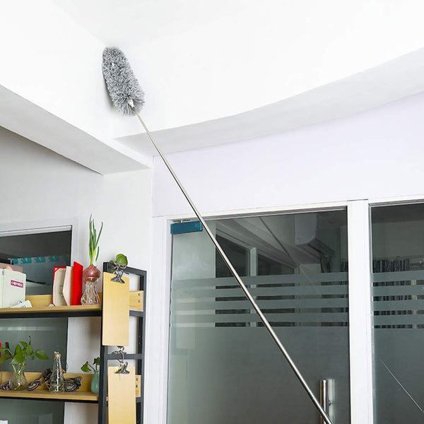 Microfiber duster with 100-inch extendable handle cleaning a high ceiling.