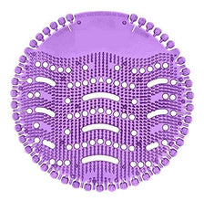 Close-up of an anti-splash urinal screen mat with bristles for effective splash reduction.