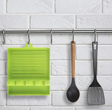 Compact silicone spatula holder and utensil rest for Indian kitchens.