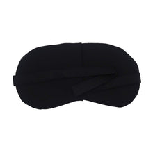 Side view of a sleep mask for travel, showing the adjustable elastic strap for a secure fit.