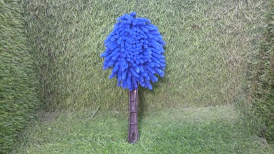 A generic cleaning duster, demonstrating the compact size and portability of the tool.