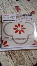 Stack of waterproof vinyl tile sticker sheets ready for home decoration projects.