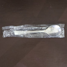 Dining spoons placed on kitchen table highlighting ergonomic design