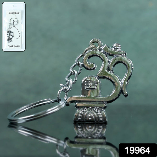 Close-up of Om Shivling keychain with detailed metalwork