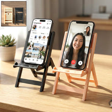 Foldable mini chair mobile phone stand holder on white background