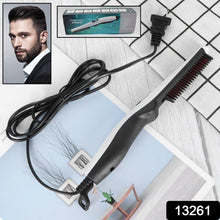 Close-up of the electric hair straightening comb's ergonomic design.