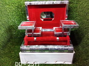 Front view of the multi-compartment wooden jewellery organizer for versatile storage.