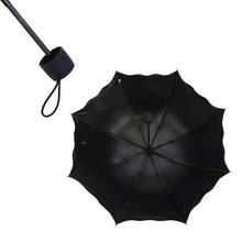 An open Magic Umbrella with its original, subtle blossom pattern before getting wet.