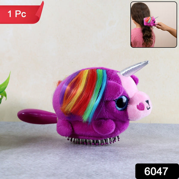 Happy child brushing her hair with the colourful Kids Unicorn Hair Brush