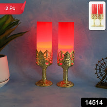 Decorative LED candle lamps glowing warmly on golden stands