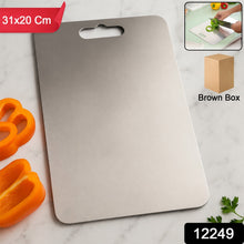 Stainless steel cutting board with orange bell pepper and parsley, with insets showing use and packaging.