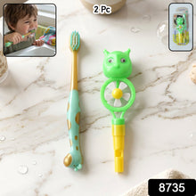 Two kids manual toothbrushes with attached animal whistle toys for oral care fun