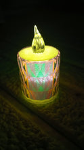 The 4-piece flameless LED candle set displayed in its packaging, ready for gifting.