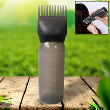 Professional hair colour applicator bottle with a graduated scale for precise mixing.