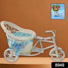 Bicycle flower pot stand holding vibrant flowers for home decor