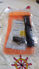 A user taking an underwater photo with their phone securely sealed in the waterproof pouch.