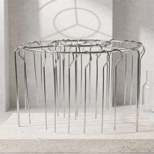 BBQ kebab stand with skewers for even cooking