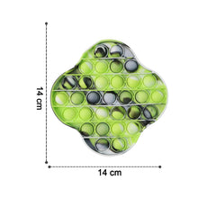 Size comparison of silicone pop it fidget toy with measuring scale