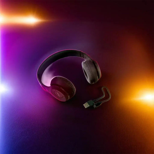Person using the Phonixio Bluetooth headset for hands-free calling.