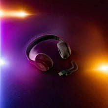 Person using the Phonixio Bluetooth headset for hands-free calling.
